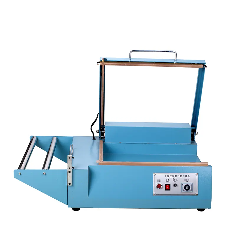 Manual L bar sealing and cutting machine connect with heat shrinkable packaging wrapping machine packing machine be production